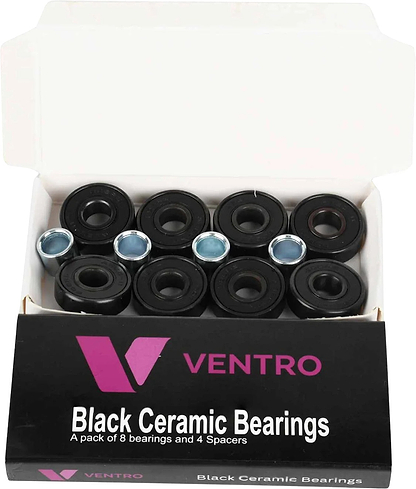 An open box of Ventro Ceramic ABEC 11 Black Bearings - Set Of 8, showing 8 black 608-size bearings and 4 metal spacers inside. The packaging displays the Ventro brand logo and product name in white and pink text.
