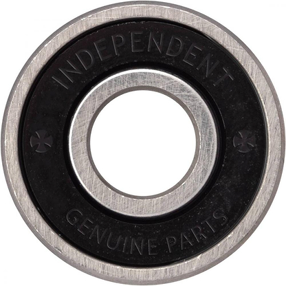 A close-up of a skateboard bearing shows the "Independent Genuine Parts" branding on its black casing. This Independent GP-B Skateboard Bearing features labyrinth shields and micro-polished steel races, along with a central hole and a shiny metallic finish.