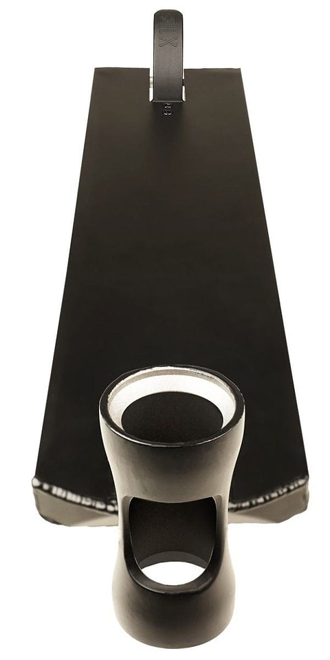 A black, wedge-shaped platform with a smooth surface and a cylindrical cutout design beneath it resembles the Madd Gear MGP MFX Juzzy Carter V2 Signature Black Stunt Scooter Deck. The white background enhances its sleek, minimalist appearance, making it feel like a piece of modern art.