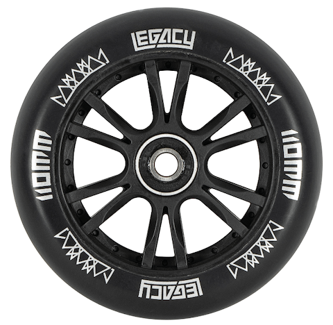 The Legacy 1.5 Pro Ventus Complete Stunt Scooter in Rainbow Neochrome/Black features striking white geometric designs on its black wheel with "LEGACY" and "110MM" printed on both sides, plus a metal core with multiple spokes—perfect for the skatepark.