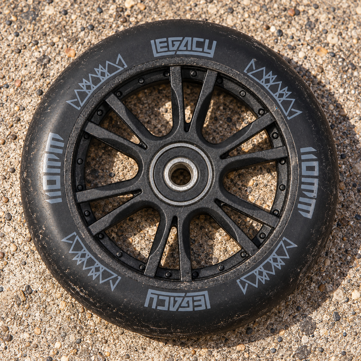 Legacy Ventus 110mm Stunt Scooter Wheel in black with a ten-spoke core and branded lettering on the tire.