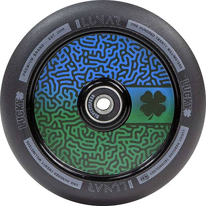 Introducing the Lucky Lunar 120mm Stunt Scooter Wheel - Maze, showcasing a vibrant design with intricate green and blue patterns on a black outer rim. At its center is a clover symbol, emphasizing the Lucky Rebound Technology. The wheel features the text “LUNAR,” “LUCKY,” and detailed specifications along its edge—ideal for creative scooter builds.