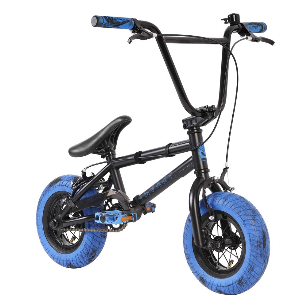 The Invert Supreme Havoc Mini BMX Bike in black and blue, crafted by Invert, features a compact design with a sporty aesthetic. It showcases blue handlebars and tires on its black frame, incorporating authentic BMX components such as a padded seat and small chain drive—ideal for action sports enthusiasts.