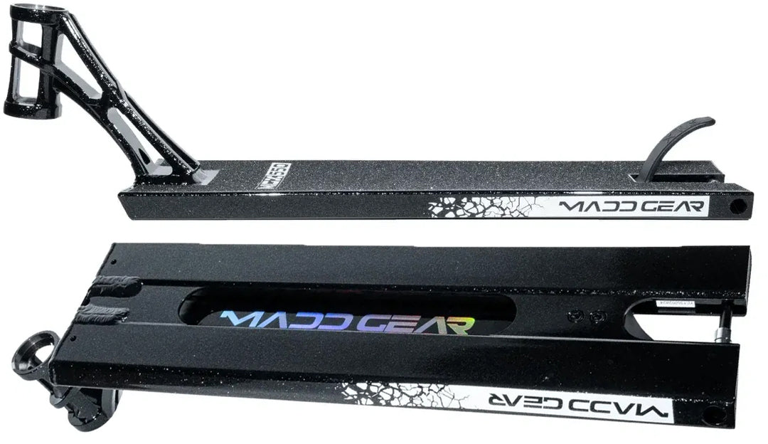 Two views of the Madd Gear (MGP) MGX Black Stunt Scooter Deck - 5.5″ x 20.5″, featuring white and rainbow logos—one image displays the top with a foot brake, while the other shows the bottom with a split cutout—ideal for both park and street scooter sessions.