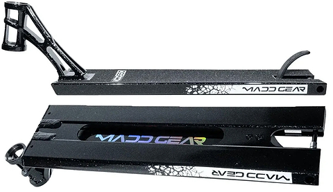 Two views of the Madd Gear (MGP) MGX Black Stunt Scooter Deck - 5.5″ x 20.5″, featuring white and rainbow logos—one image displays the top with a foot brake, while the other shows the bottom with a split cutout—ideal for both park and street scooter sessions.