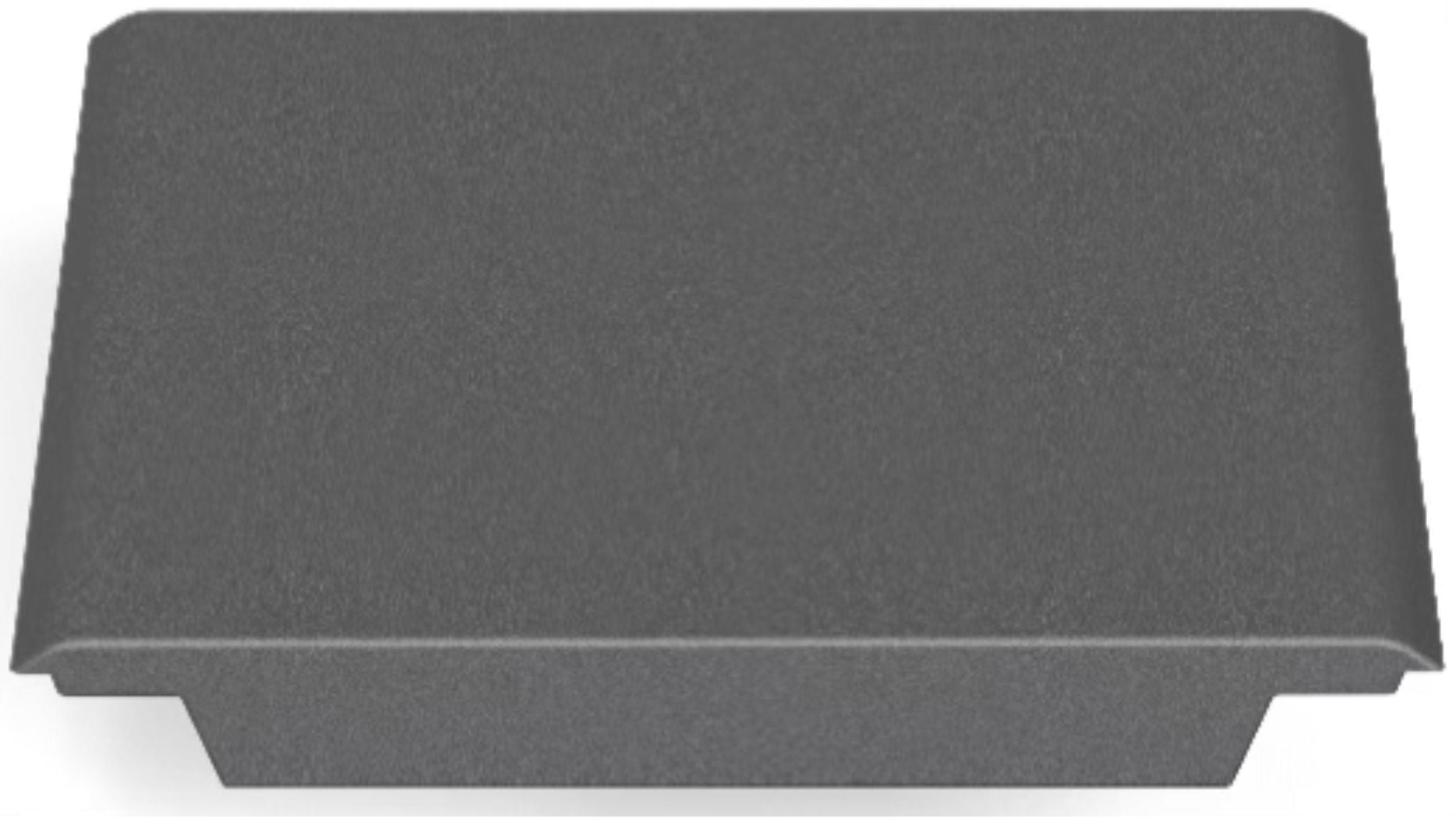 A gray, rectangular plastic cover with a smooth, slightly raised top and flared edges, resembling the CORE Mini Funbox Ramp Set – 2 Kickers & Flat Deck by CORE, viewed from an angle showing both the top and one side.