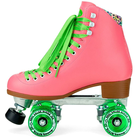 The eye-catching Moxi Beach Bunny Quad Roller Skates - Watermelon features a vivid pink exterior with green laces and matching wheels. Inside, the skates showcase a floral pattern along the upper, enhanced by a brown heel and a black stopper at the front, making them ideal for those skating in Moxi's signature style.