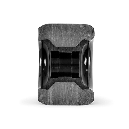 Close-up view of the Mindless Viper 65mm 82A Longboard Wheels in black, showcasing their cylindrical shape and smooth, glossy surface with a symmetrical design. The wheels have a metallic appearance with a central hollow section that highlights their intricate construction and reflective finish for optimal grip and control.