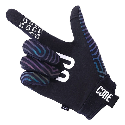 The CORE Aero Skate Protection Gloves - Neochrome Reflective, by CORE, boast a sleek black design adorned with blue and purple wavy patterns on the fingers. They are touch screen friendly with extended index and little fingers while the middle and ring fingers are folded. The bold "CORE" logo is prominently displayed on the wrist area.