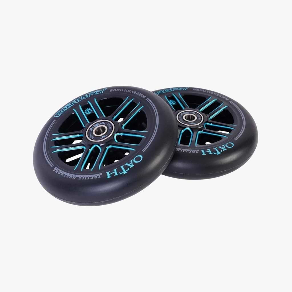 The Oath Binary 110mm Stunt Scooter Wheels in Black and Blue showcase intricate hub designs with blue accents. The rims are adorned with the text “OATH,” and each wheel is equipped with high-grade Oath Fidelity bearings at the center. These wheels are notable for their exceptional impact resistance.
