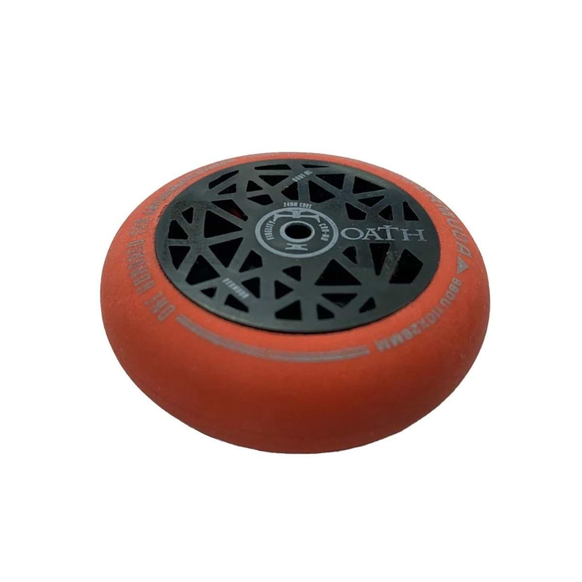 The Oath Scooter Wheel Pencil Eraser - Red by CORE features a geometric black core design and makes a perfect addition to any scooter enthusiast’s collection or as a unique pencil case accessory.