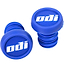 The ODI Push-In Stunt Scooter Bar Ends in blue are branded with "odi" in white text on their top surfaces. These two rubber pieces placed against a white background provide resin protection and allow for color customization.