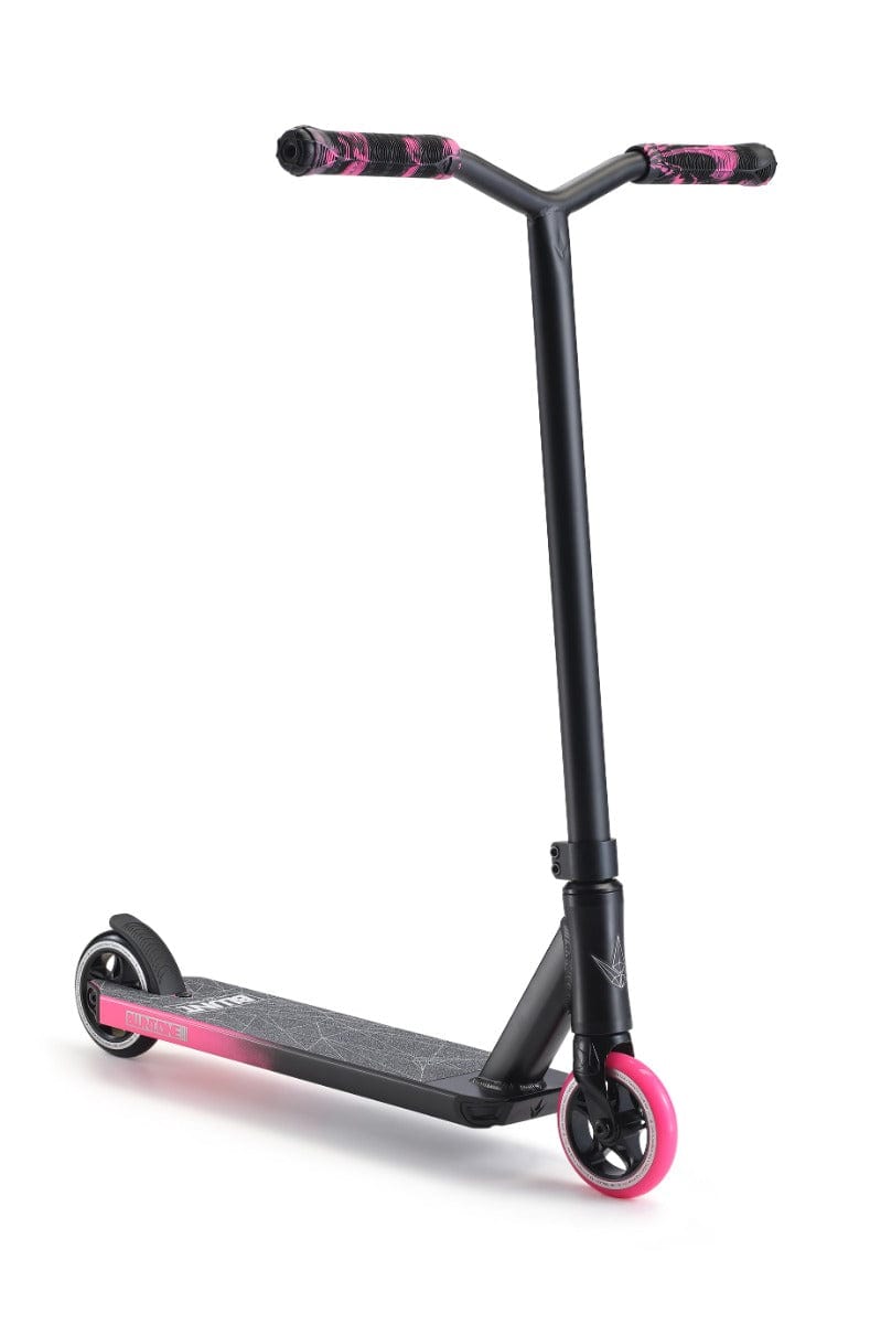 The Blunt Envy ONE S3 Complete Stunt Scooter in Black and Pink boasts a standout design with bold pink handle grips and a matching pink front wheel. Its minimalist deck, paired with a black back wheel, contrasts beautifully against its plain white backdrop, making it ideal for those who desire high-quality pro scooter parts with style.