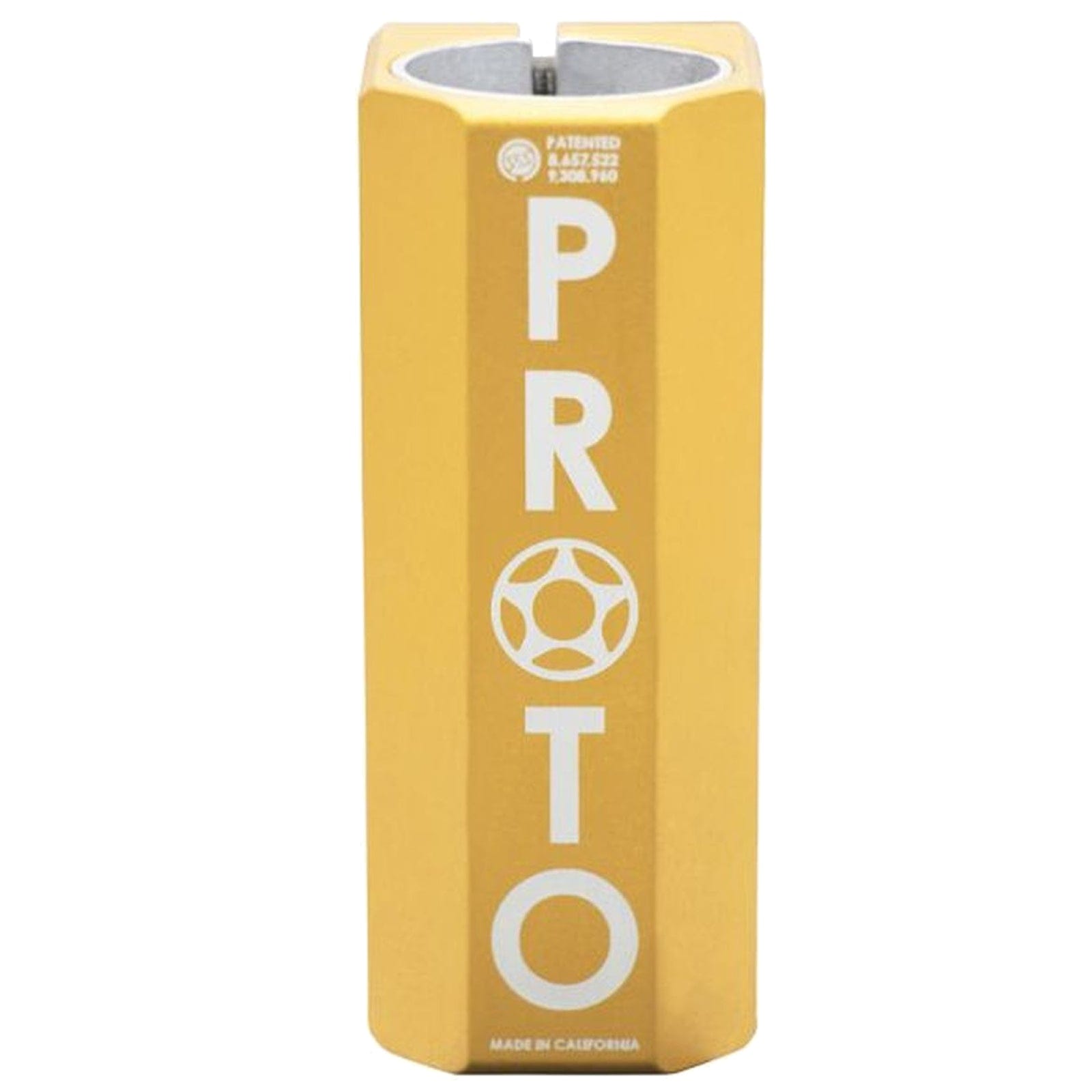 A tall, yellow Proto scooter peg with a hexagonal shape and white branding pairs perfectly with the Proto Full Knuckle V2 4 Bolt Oversized SCS Stunt Scooter Clamp in gold. The word "PROTO" is displayed vertically next to a circular logo, highlighting its California craftsmanship.