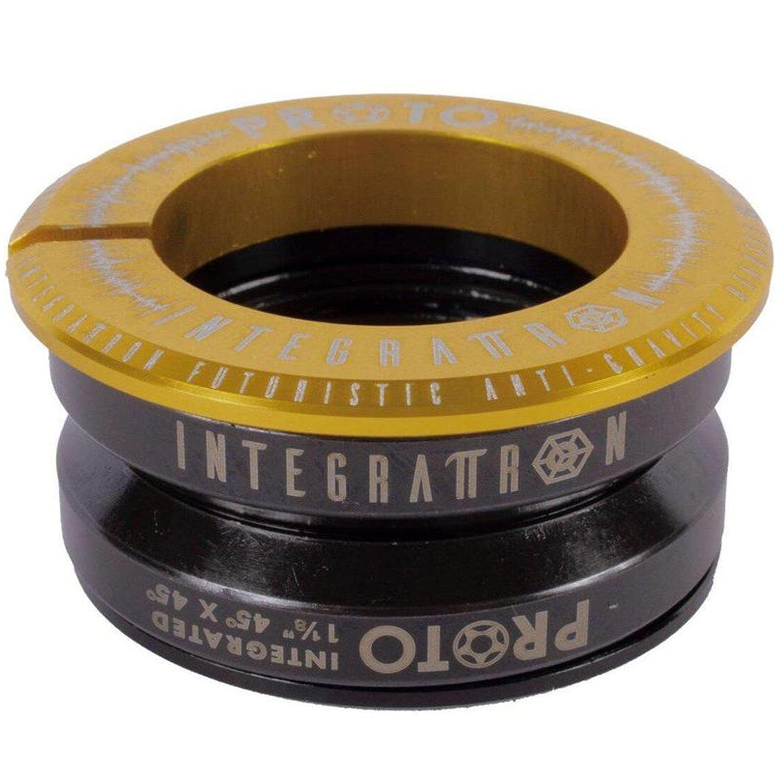 The Proto Integrattron Integrated Stunt Scooter Headset in Gold is a lightweight headset, featuring black and gold engraved text and design elements. With a metallic finish, it is composed of two main integrated parts and showcases clear Proto branding throughout.