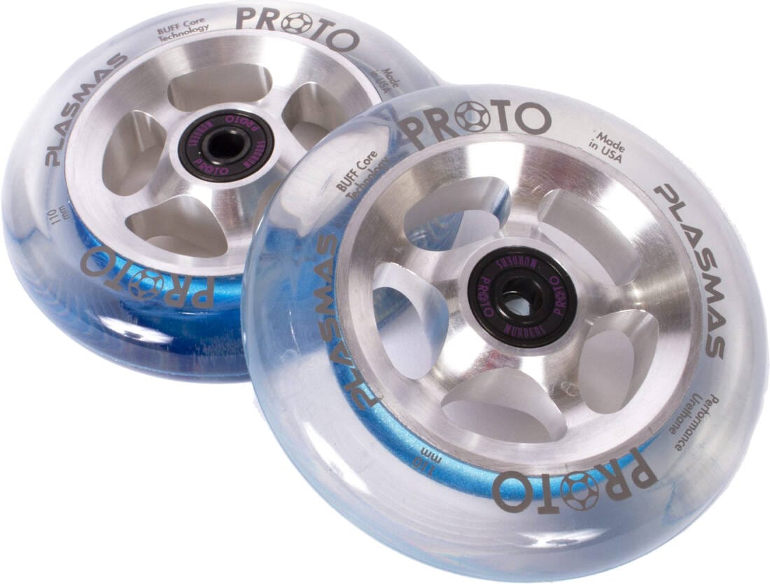 Displayed are two Proto Plasma 110mm Stunt Scooter Wheels in Starlight finish, featuring transparent blue rims and silver inner surfaces. These wheels boast black central bearings, proudly displaying the "PROTO" and "PLASMA" logos. Enhanced with BUFF Core Technology, they look clean, polished, and ready for a smooth ride.