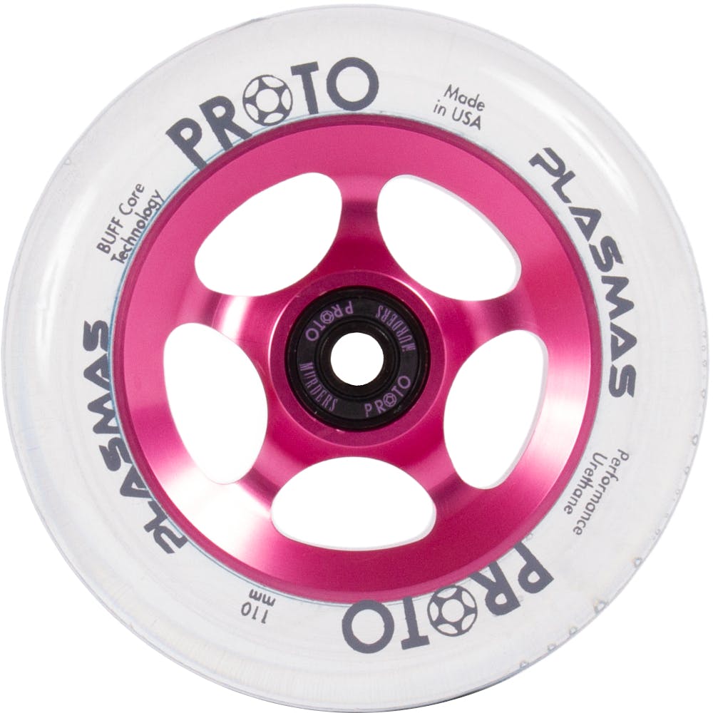 A detailed view of the Proto Plasma 110mm Stunt Scooter Wheel in Clear/Neon Pink highlights its BUFF Core Technology and a pink metallic core with four oval cutouts. The translucent tire is crafted using the Alien urethane formula, and the text on the wheel reads "Made in USA" and "Performance Urethane.