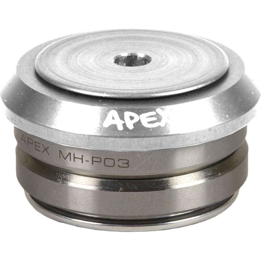 Close-up of a raw silver Apex Integrated Stunt Scooter Headset, showcasing a round top with the brand’s engraved logo. Designed for scooters, this headset features a stack of metal components and a central hole on its surface, echoing the sleek construction typical of integrated scooter decks.