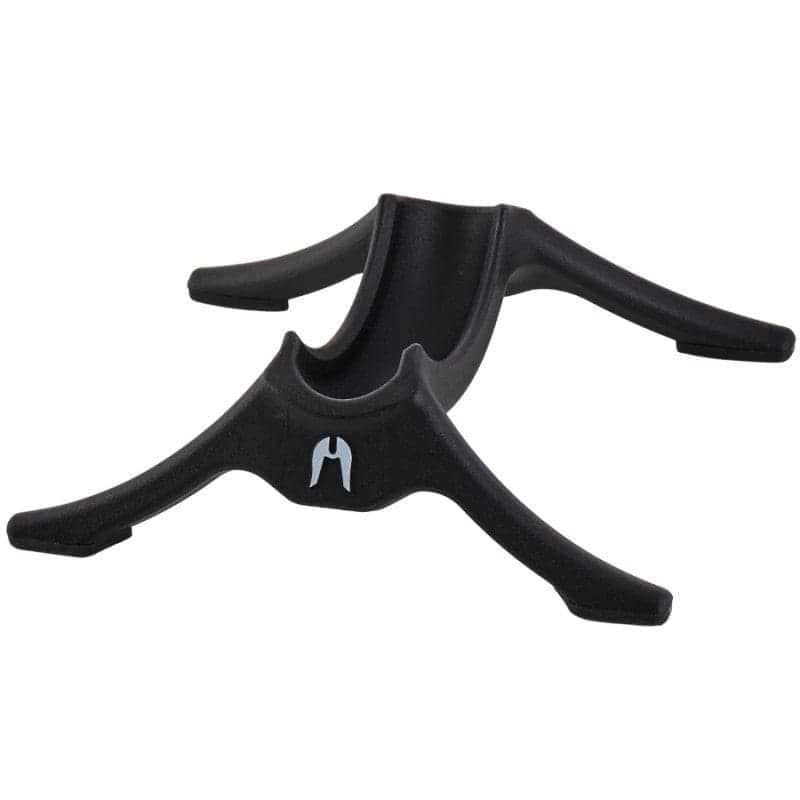 A black Ethic DTC Classic Scooter Stand, featuring a sleek, curved design, is displayed against a white background. With its stable four-legged base and supportive area for the scooter's body, it provides reliable sturdiness just like a guitar stand does.