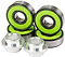 A pack of four Madd Gear MGP K-3 ABEC 11 green scooter bearings is arranged alongside two silver, cylindrical axle spacers. Imprinted with "K3 MAD," these high-precision wheel bearings are showcased in a close-up image with shining components.