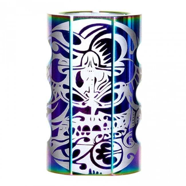 The Infinity Mayan 4 Bolt Oversized SCS Stunt Scooter Clamp in Neochrome is a cylindrical clamp with intricate cut-out designs featuring a seated figure surrounded by abstract patterns. Its durable construction ensures stability, while the neochrome finish reflects a spectrum of colors, adding vibrancy to the artistic design.