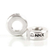 Two raw silver, circular metal BMX headset spacers with a hole in the center display the word "APEX" alongside an anarchy symbol in black. One spacer stands upright while the other rests on its side against a white background, enhancing your scooter accessories collection similarly to the Apex Aluminium Scooter Bar Ends - Raw Silver.