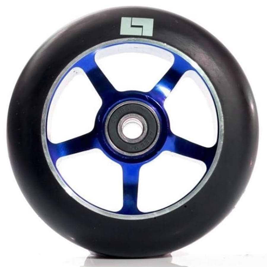 A detailed view of a 100mm black and blue stunt scooter wheel from Logic showcases its robust metal core constructed from durable 6061-T6 aluminum. This Logic 5 Spoke Wheel is equipped with ABEC 9 bearings for an exceptionally smooth ride, and features a subtle logo near the top. Its glossy blue surface pops against the white backdrop.