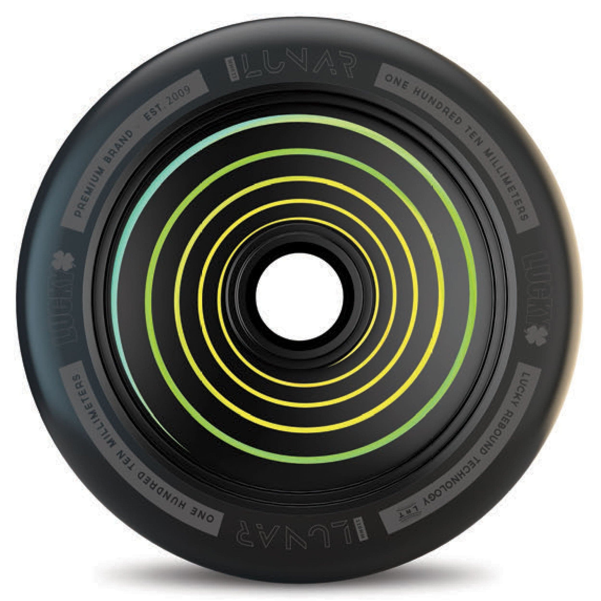 The Lucky Lunar 110mm Stunt Scooter Wheel - Hypnotic from Lucky features a sleek black design embellished with vibrant yellow and green circles, made from high-performance urethane to deliver lightweight wheels that transform smooth riding.