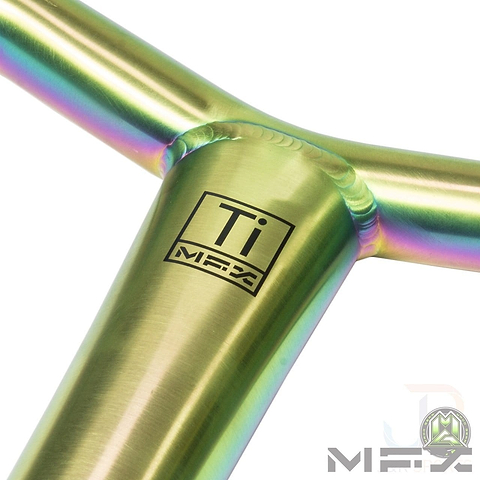 Close-up of a metallic bike frame with a shiny neochrome finish. The image focuses on the joints, featuring the letters "Ti" and "MFX" printed on the frame, highlighting its Grade 9 Titanium quality similar to the Madd Gear MGP MFX BAMF Titanium Oversized SCS Stunt Scooter Bar - Neochrome 660mm x 660mm.