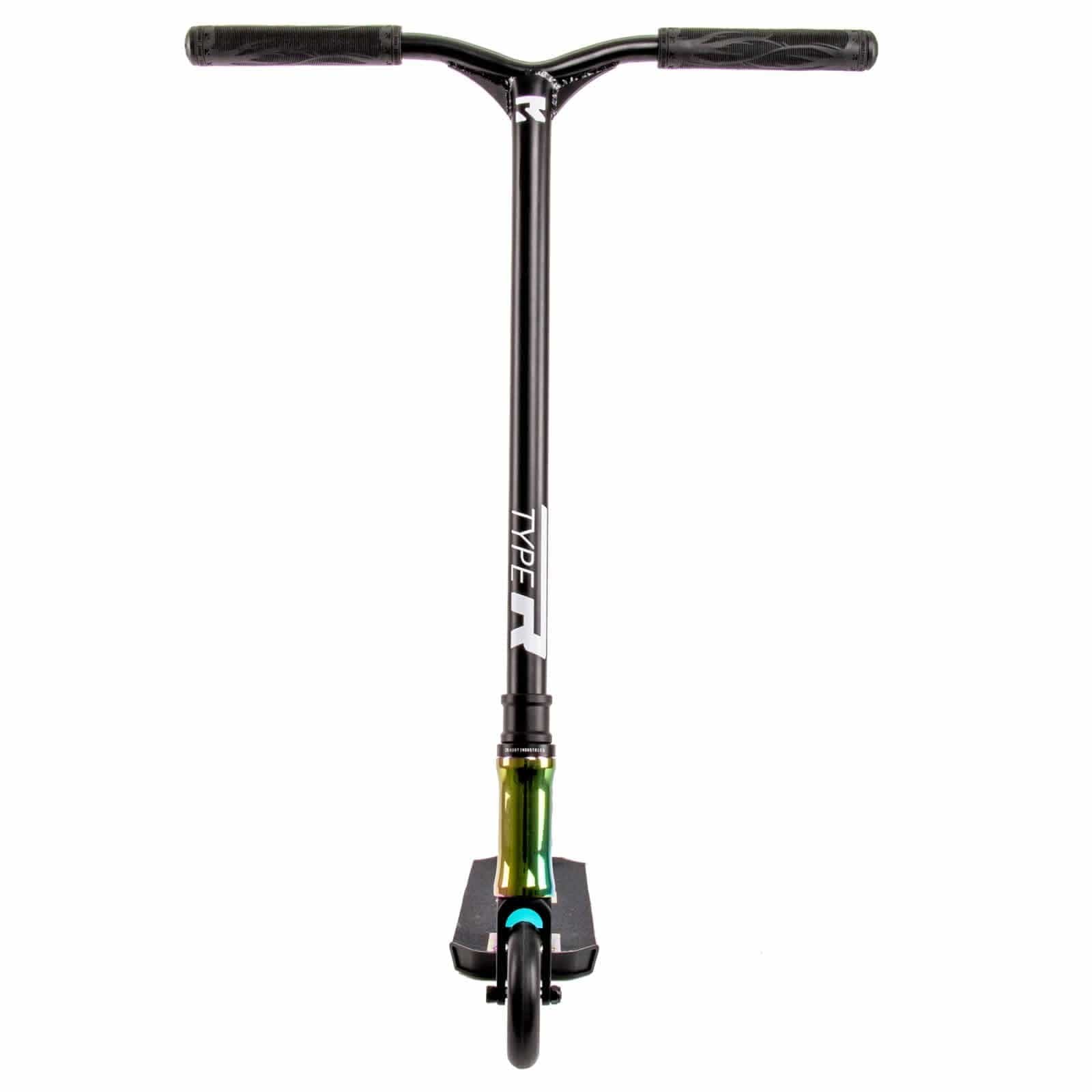 The Root Industries Type R Complete Stunt Scooter in Rocket Fuel Neochrome features a lightweight aluminum deck and wide handlebars, designed specifically for intermediate and advanced riders. This stylish, minimalistic scooter is engineered for performance and agility, emphasizing its distinctive single front wheel configuration.
