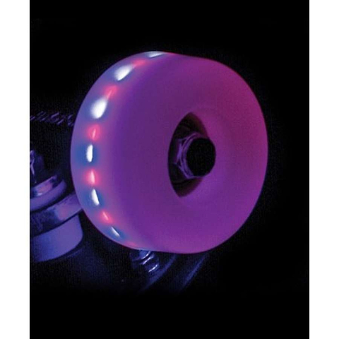 Against a dark backdrop, a vibrant pink skateboard wheel radiates with brilliance. Encircling its edge are small red and white lights that evoke the nostalgic charm of roller disco nights, casting an eye-catching display as they whirl around—reminiscent of the captivating Rio Roller Light Up 82A Quad Roller Skate Wheels in Pink Frost by Rio Roller.