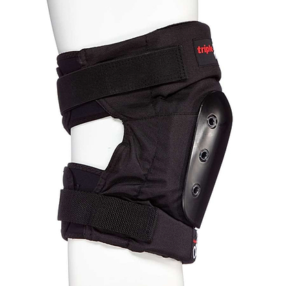 The Triple 8 KP 22 Knee Skate Protection Pads in black are crafted with EVA memory foam and adjustable straps, equipped with a hard protective shell on the side to provide skaters with exceptional impact protection. Displayed on a white mannequin leg, these pads from Triple 8 elegantly blend style and functionality for any skating enthusiast.