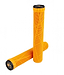 The Addict OG Orange Stunt Scooter Grips - 180mm, made from super soft TPR for optimal comfort, come in a vibrant orange hue and are topped off with a black cap featuring an engraved design. Against a white backdrop, one grip stands vertically while the other leans against it.