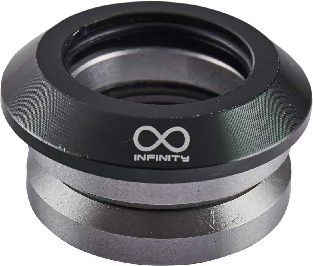 Introducing the Infinity Integrated Stunt Scooter Headset - Blackops by Infinity: a CNC-milled metal component with a sleek, dark outer ring engraved with an infinity symbol and "INFINITY." This polished piece includes grooves and sealed bearings, likely designed as part of a stunt scooter or larger machinery.