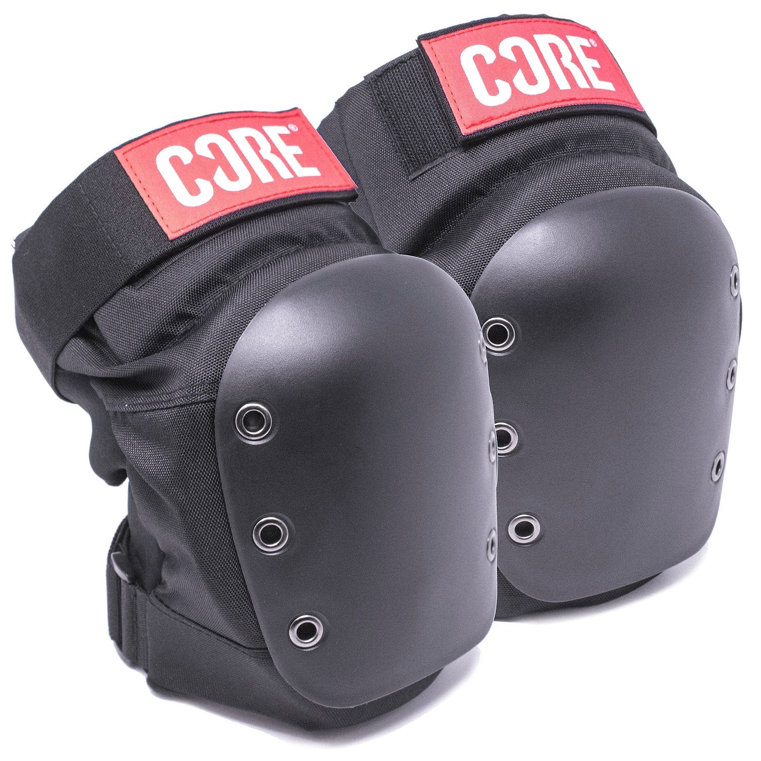 The CORE Pro Street Knee Skate Protection Pads in black feature hard shell covers and metal rivets, crafted with breathable neoprene for comfort. Each pad includes a distinctive red label with "CORE" printed in white. They are displayed side by side on a pristine white background, ensuring both durability and style.