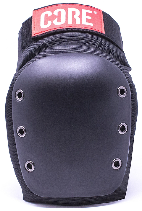 The CORE Pro Street Knee Skate Protection Pads in black are designed with a breathable neoprene construction and six metal rivets, featuring a red "CORE" label on the upper strap. They have a hard shell for impact resistance and EVA foam for enhanced comfort, ensuring superior knee protection.