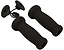 The JD Bug Original Street Foam Scooter Grips in black include two cylindrical handlebar grips and two disc-shaped end plugs with a coiled wire, designed for easy insertion. These are perfect for enhancing the comfort of your scooter rides.