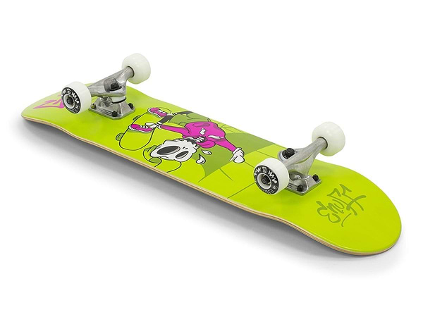 The Enuff Skully Green Complete Skateboard - 7.75" x 31.5" from Enuff is lime green with white wheels, featuring a cartoon character in a pink outfit holding a skateboard. This entry-level skateboard is ideal for beginners and boasts bold black and yellow graffiti-style text on the underside of its 7-ply maple deck near the tail.