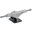 A close-up of the Enuff Decade Pro Satin Black Skateboard Truck showcases its silver hanger, mounted on satin finish baseplates. This 139mm model features visible axle nuts and a kingpin, with the Enuff brand logo laser etched on the hanger for an added touch of detail.
