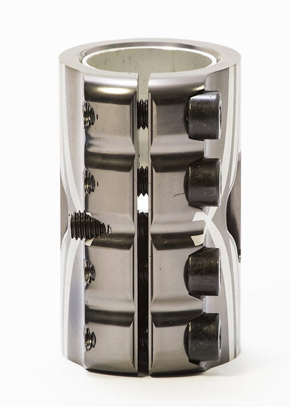 Close-up of the Logic V2 4 Bolt Oversized SCS Stunt Scooter Clamp - Polished by Logic, highlighting its CNC machining precision. This lightweight clamp boasts a cylindrical design with four bolt holes and a polished surface, split down the middle to reveal threads and screws, all set against a plain white background.