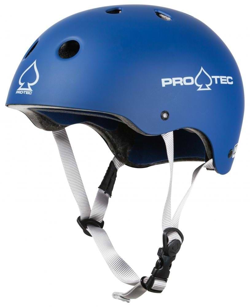 A Matt Blue Pro-Tec Classic Certified Skate / Scooter Helmet comes with white adjustable straps and ventilation holes on top. This extreme sports helmet features a high-impact absorbing ABS shell and displays the Pro-Tec logo on the sides, ensuring both safety and style.