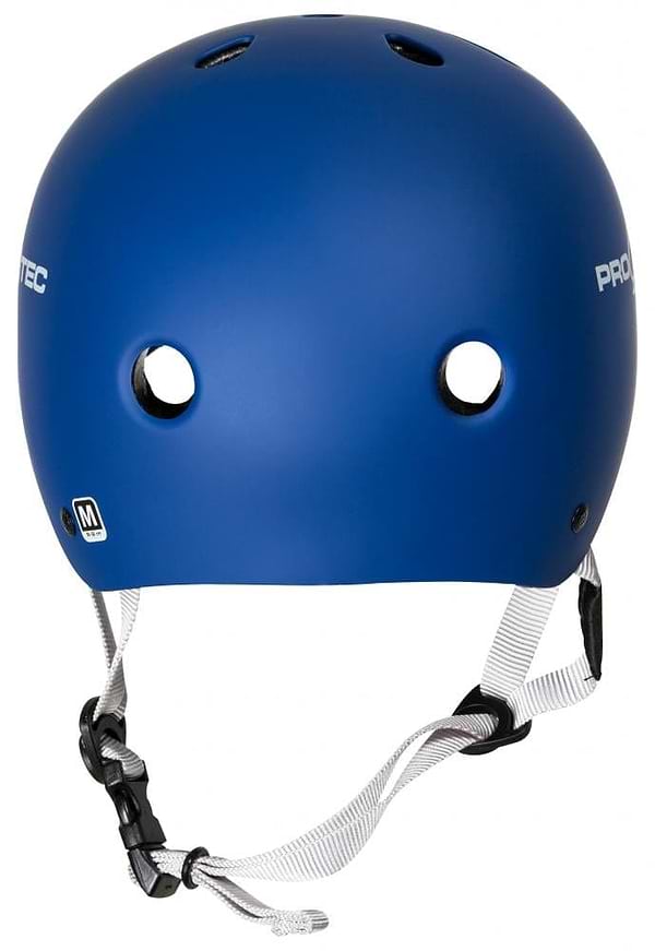 The Pro-Tec Classic Certified Skate/Scooter Helmet in Matt Blue features ventilation holes, white chin straps, and a black buckle. It prominently displays "PROTEC" on the side and includes a size "M" sticker on the back, equipped with a high-impact absorbing ABS shell for superior protection.