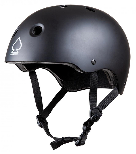 A Pro-Tec Prime Skate/Scooter Helmet in black is displayed against a white background, featuring ventilation holes and adjustable straps. Its smooth exterior and integrated EPS foam offer exceptional protection, accentuated by the iconic Pro-Tec logo.
