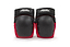 A pair of REKD Ramp Knee Skate Protection Pads in black and red, featuring hard black caps with the "REKD" logo on top. Designed for action sports, these knee pads provide impact resistance suitable for skateboarding and rollerblading.
