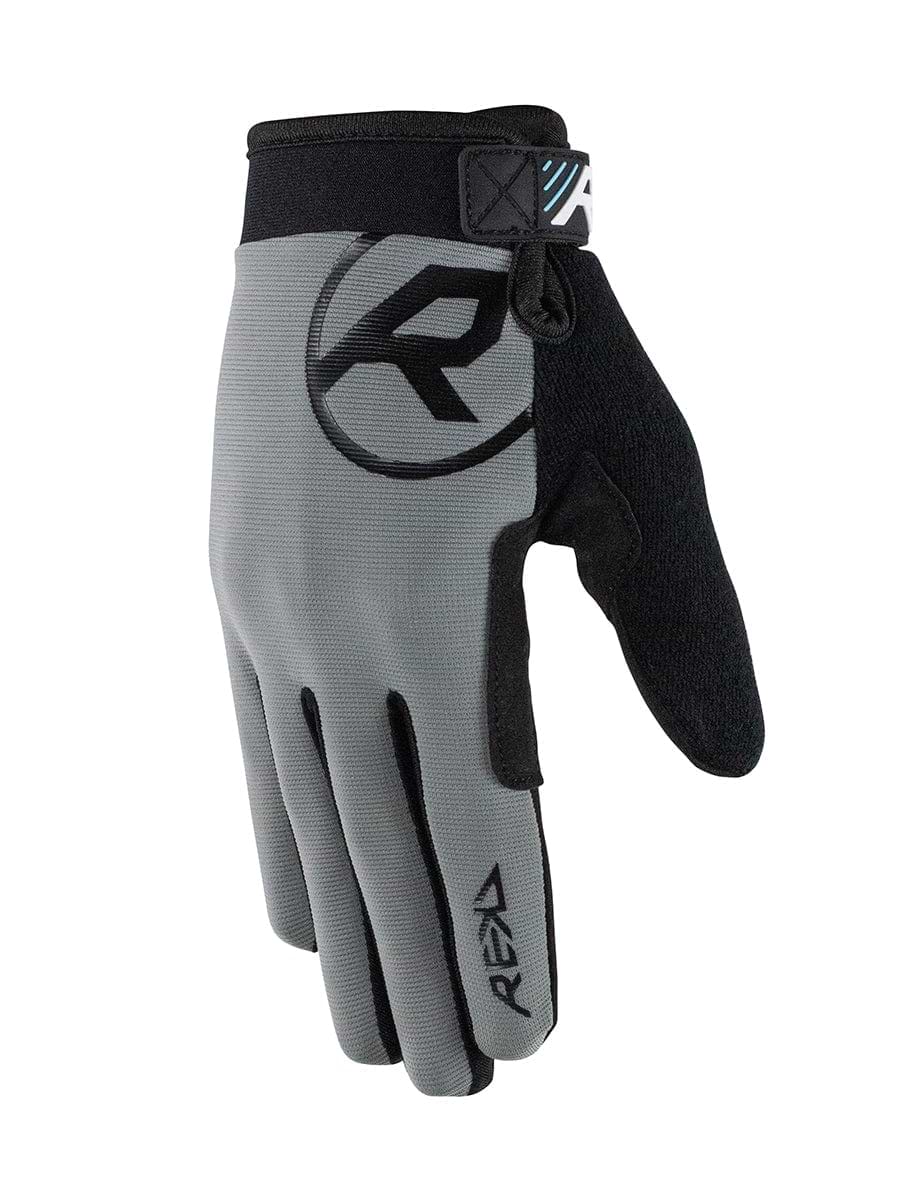 The REKD Status Skate Protection Glove in gray features a large "R" logo on the back and provides an ergonomic fit with an adjustable wrist strap. Its textured palm ensures optimal grip, while its sleek, modern design is touchscreen-friendly, making it a perfect accessory for sports or outdoor activities.