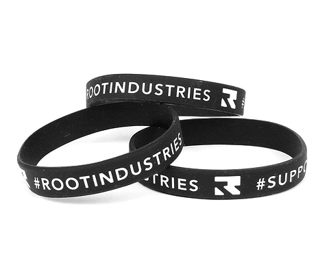 The Root Industries Scooter Wrist Bands in black, emblazoned with white text, perfectly reflect the spirit of the brand. Two wristbands are stacked to prominently display "#ROOTINDUSTRIES," while a third, positioned at the front, features "#SUPPORT" alongside their distinctive stylized "R" logo—ideal for any scooter enthusiast.