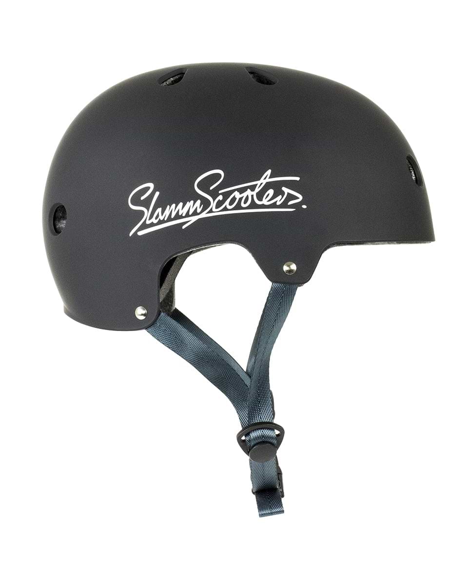 The Slamm Logo Skate / Scooter Helmet in black is a stylish safety helmet tailored for scooter riders, displaying the "Slamm Scooters" logo on the side. It includes ventilation holes and adjustable straps, ensuring it meets EN1078 safety standards for excellent protection.