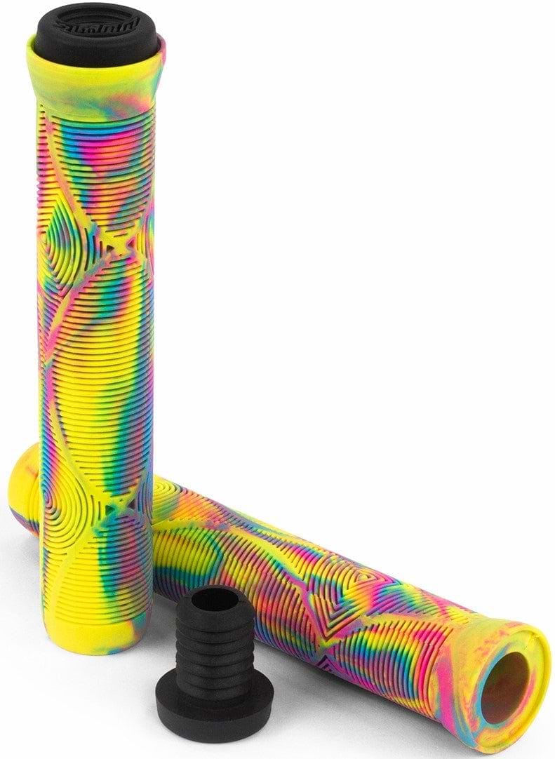 Displayed are two vibrant 165mm Slamm Team Swirl Tropical Yellow Stunt Scooter Grips with a swirling rainbow pattern, one positioned flat and the other upright. The black bar end cap is also shown, ideal for enhancing comfort and control in any scooter upgrade.