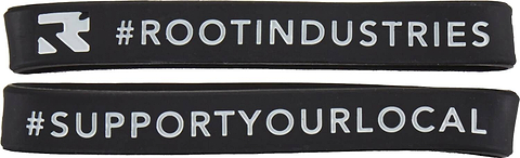 Adorn your wrist with two stylish black Root Industries Scooter Wrist Bands, featuring contrasting white text that embodies their scooter-inspired appeal. The top band proudly highlights "#ROOTINDUSTRIES," while the bottom one motivates with "#SUPPORTYOURLOCAL." An ideal accessory for fans of Root Industries and passionate scootering enthusiasts.