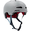 The REKD Ultralite In-Mold Skate / Scooter Helmet in grey is ideal for action sports, equipped with advanced In-Mold technology. This protective helmet features a red interior padding and proudly displays the "REKD" logo on the side. It offers comfort with multiple ventilation holes, adjustable black chin straps, and a blue buckle for secure fastening.